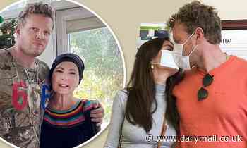 Emily Ratajkowski kisses Sebastian Bear-McClard with surgical mask and reveals mom's illness battle