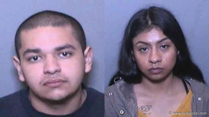 Couple arrested, charged in death of man found stabbed on Tustin street