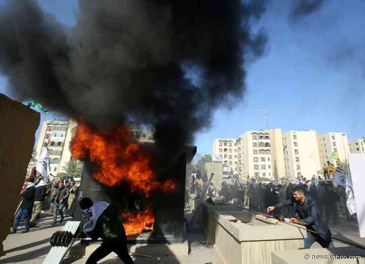 Pro-Iran protesters storm US embassy over deadly Iraq strikes