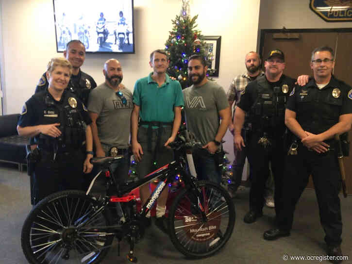 Police union donates a new bike and helmet to a cyclist after he is robbed in Seal Beach