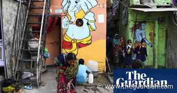 The murals brightening a Delhi slum – in pictures