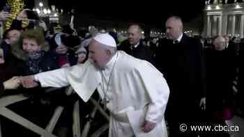 Pope says sorry for losing patience with well-wisher who yanked his arm