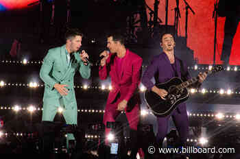 Watch the Jonas Brothers Share Sweet Midnight Kisses With Their Wives in Miami on New Year's Eve