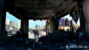 Militia withdraw from U.S. Embassy in Iraq as Trump deploys more troops