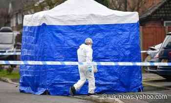 Man held on suspicion of double murder after bodies found in house