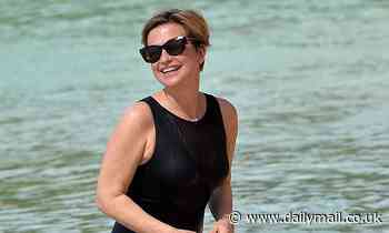 Emma Forbes, 54, strips down to a black swimsuit to show off her enviable physique in Barbados