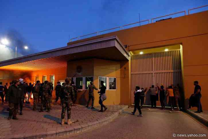 Protesters burn security post at U.S. Embassy in Iraq in new foreign policy test for Trump