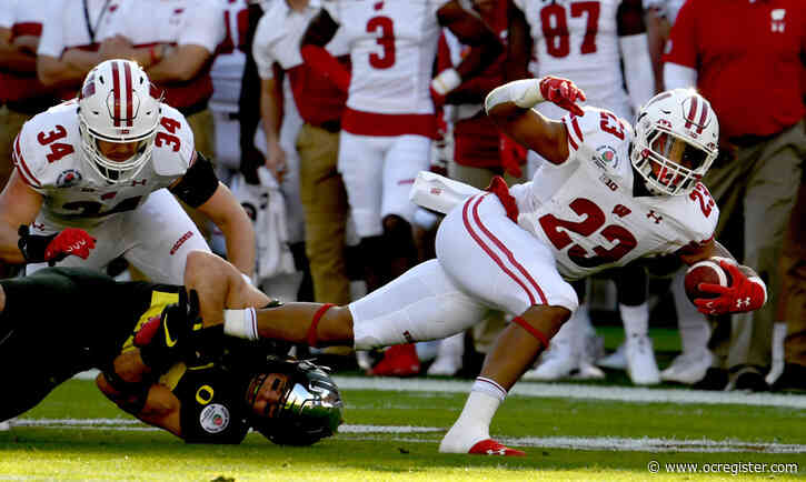 Wisconsin’s Jonathan Taylor walks away with Rose Bowl loss and heavy decision still at hand
