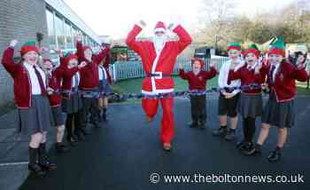 Elf run for Bolton Hospice raises thousands through schools