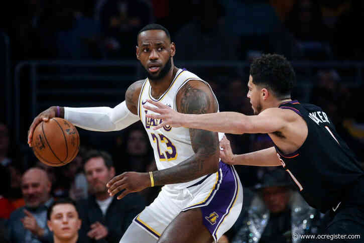 Lakers scramble to hold on for win over Phoenix to start new year