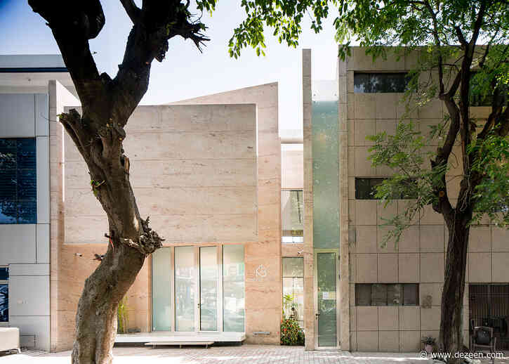 Oval-shaped meeting room is centrepiece of granite office in Chandigarh