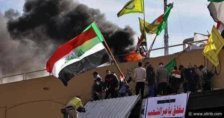 Militiamen withdraw from U.S. Embassy but Iraq tensions linger