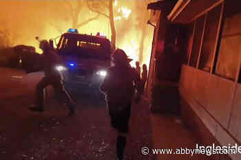 Some flee, others restock before Australian wildfires worsen