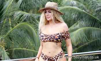 Chloe Ferry goes topless and flaunts her ample assets and her pert derrière in Thailand