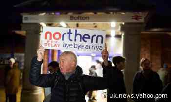 Commuters gather at Bolton station in protest over increased rail fares