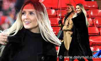 Perrie Edwards looks glamorous as she joins beau Alex Oxlade-Chamberlain's mum at football match