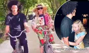 Madonna, 61, enjoys bike ride with toyboy beau, 25,  in the Maldives
