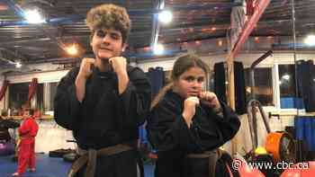 Small community karate dojo teaching kids self defence, building self esteem