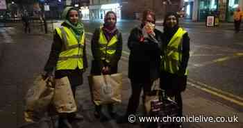 Kind-hearted volunteers hand out scarves and gloves to the homeless in Newcastle city centre