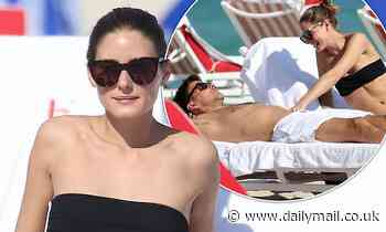 Olivia Palermo showcases her figure as she soaks up the sun in Miami with husband Johannes Huebl