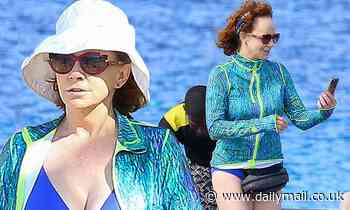 Reba McEntire, 64, takes in a turtle-watching expedition while on holiday in Barbados over New Years