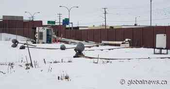 Worker trapped under bucket of tipped picker truck in north Edmonton