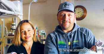 Minnesota couple welcome twins born in two decades