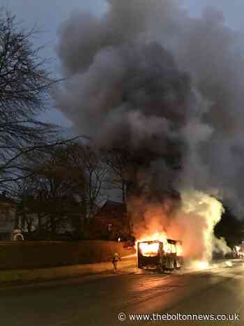 Chorley New Road closed after bus catches fire