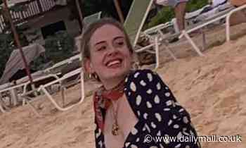 Adele shows off her three stone weight loss in floral dress as she holidays with Harry Styles