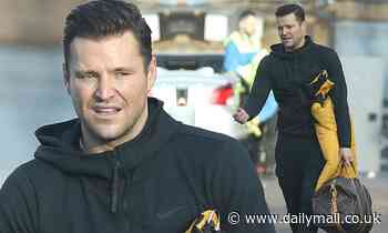 Mark Wright cuts a casual figure in black tracksuit at the gym