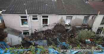 The homes still empty after a huge landslide crashed into them seven years ago