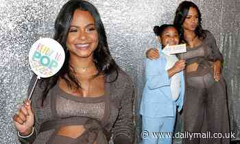 Christina Milian sports a sparkling crop top with a matching duster at her baby shower