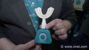 Y-Brush toothbrush brushes all your teeth in just 10 seconds video     - CNET