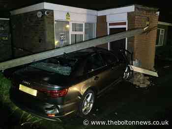 Suspected stolen car smashes into office building in Addington Road