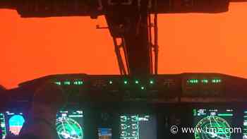 Australian Air Force Plane Flying Through Red Smoke From Wildfires