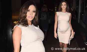 Pregnant Pascal Craymer displays her growing baby bump as she attends film premiere