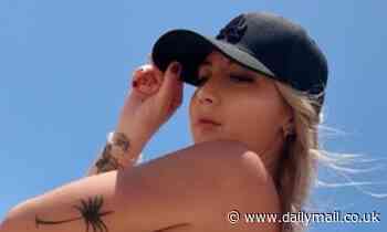 Steve Irwin's 'hot niece' Rebecca Lobie goes TOPLESS at the beach