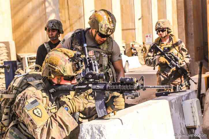Pentagon chief denies U.S. leaving Iraq; Tehran crowds mourn commander