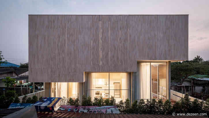 Timber shutters conceal Bangkok home designed for writing and baking
