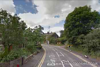 Crashed car left facing wrong way after smashing into tree in Bury Old Road