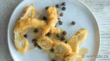 Deep-Fried Bannock with Saskatoon Berries: A crispy, doughy, syrup-drenched dream dessert