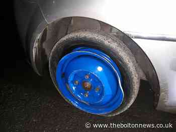 Drink driver arrested driving in car with deflated tyre