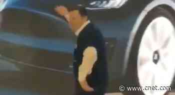 Watch Elon Musk bust out the awkward dance moves at a Tesla event in China     - CNET