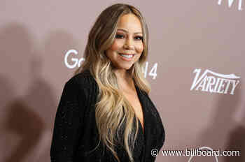 Just Some Photos of Mariah Carey Wearing a Sequined Gown in a Hot Tub
