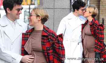 Chloe Sevigny unveils her baby bump during very loved-up stroll