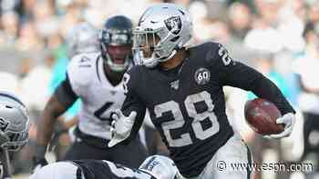 Once homeless, Raiders' Jacobs buys dad house