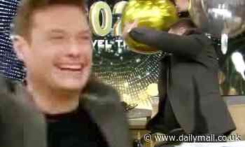 Ryan Seacrest takes a nasty fall from his chair during Live with Kelly taping