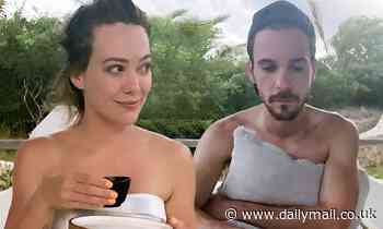 Hilary Duff sits wrapped in a towel as she embraces the honeymoon lifestyle