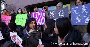 Two dozen rally to support University of Minnesota undergrad who alleges she was raped by Chinese billionaire