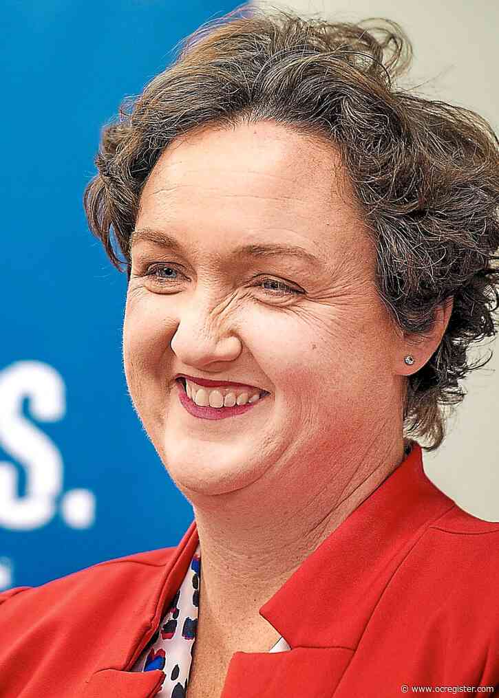 Reps. Katie Porter and Lou Correa campaign in Iowa with Elizabeth Warren and Joe Biden